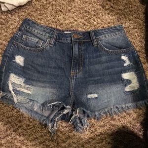 Distressed denim shorts